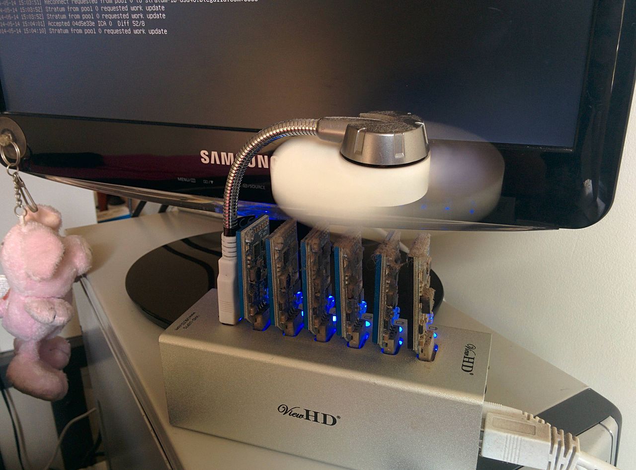 Several ASICMINER ASIC-based USB mining devices